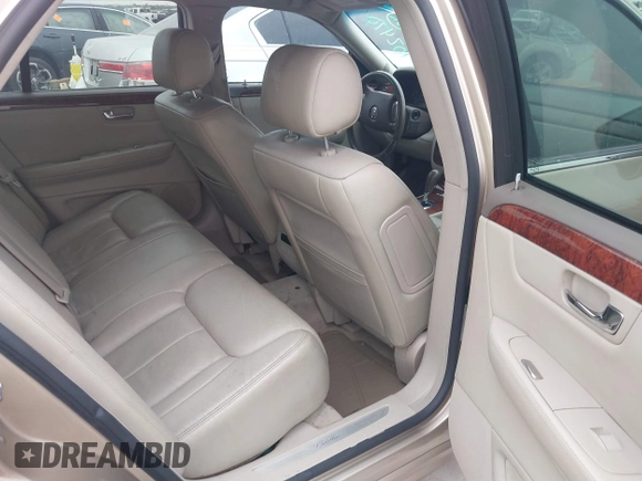 2006 Cadillac DTS 1SC z VIN 1G6KD57Y56U102470, wystawiony jako IAAI lot #40758530 z przebiegiem 149 330 mil mil oraz . Historia ofert i sprzedaży dostępna na DreamBid. Obrazek 8.