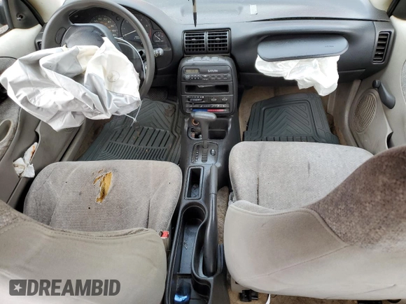 1997 Saturn SL z VIN 1G8ZH5285VZ188074, wystawiony jako Copart lot #51501005 z przebiegiem 125 973 mil mil oraz Nie do naprawy • Non repairable. Historia ofert i sprzedaży dostępna na DreamBid. Obrazek 8.