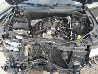 2018 Jeep Grand Cherokee Summit with VIN 1C4RJFJT2JC390079, listed as a Copart auction lot 43502555 with 106,724 mi miles and Salvage title. Bid and sale history available at DreamBid. Image 12.