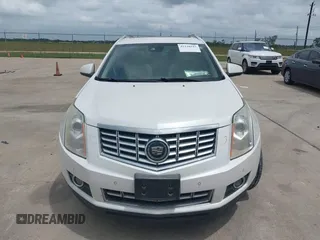 2014 Cadillac SRX Premium Collection with VIN 3GYFNDE31ES615995, listed as a IAAI auction lot 42148943 with 232,752 mi miles and . Bid and sale history available at DreamBid. Image 12.