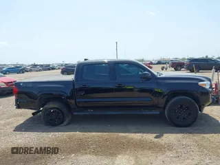 2018 Toyota Tacoma SR with VIN 5TFAX5GN5JX126118, listed as a IAAI auction lot 41949791 with 37,615 mi miles and . Bid and sale history available at DreamBid. Image 13.