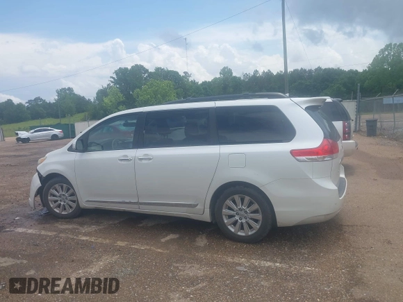 2014 Toyota Sienna XLE with VIN 5TDYK3DC2ES517663, listed as a IAAI auction lot 42171862 with 143,447 mi miles and . Bid and sale history available at DreamBid. Image 14.