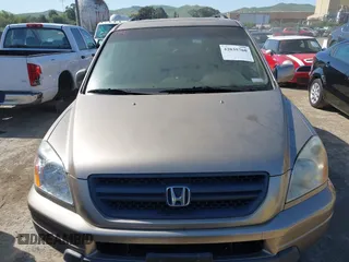 2005 Honda Pilot EX-L with RES with VIN 2HKYF186X5H506915, listed as a IAAI auction lot 42035760 with 234,624 mi miles. Bid and sale history available at carsss.com. Image 6.