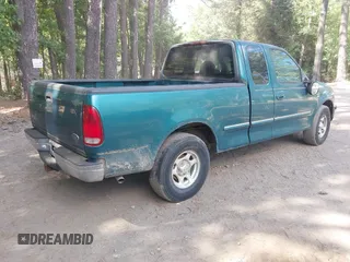 1998 Ford F-150 XL with VIN 1FTRX17L2WNA14048, listed as a IAAI auction lot 42647951 with 217,874 mi miles and . Bid and sale history available at DreamBid. Image 4.