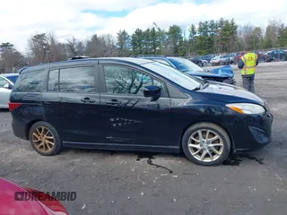 2012 Mazda 5 Touring with VIN JM1CW2CL8C0111574, listed as a IAAI auction lot 41999112 with 126,963 mi miles and . Bid and sale history available at DreamBid. Image 13.