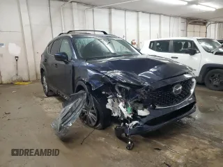 2023 Mazda CX-5 Signature with VIN JM3KFBXY9P0122887, listed as a Copart auction lot 88993465 with 12,116 mi miles and Salvage Title. Bid and sale history available at carsss.com. Image 4.