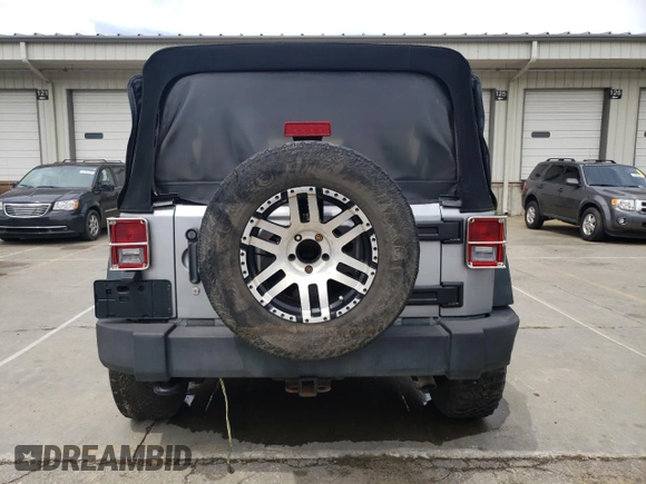 2013 Jeep Wrangler Unlimited Sport z VIN 1C4BJWDG2DL685896, wystawiony jako Copart lot #53951415 z przebiegiem 142 516 mil mil oraz Tytuł czysty. Historia ofert i sprzedaży dostępna na DreamBid. Obrazek 6.