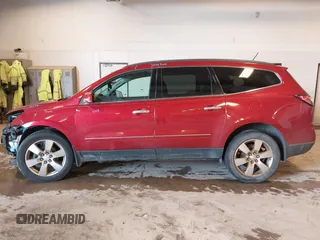 2014 Chevrolet Traverse LTZ z VIN 1GNKRJKD8EJ210990, wystawiony jako IAAI lot #41655601 z przebiegiem 218 804 mil mil oraz . Historia ofert i sprzedaży dostępna na DreamBid. Obrazek 14.