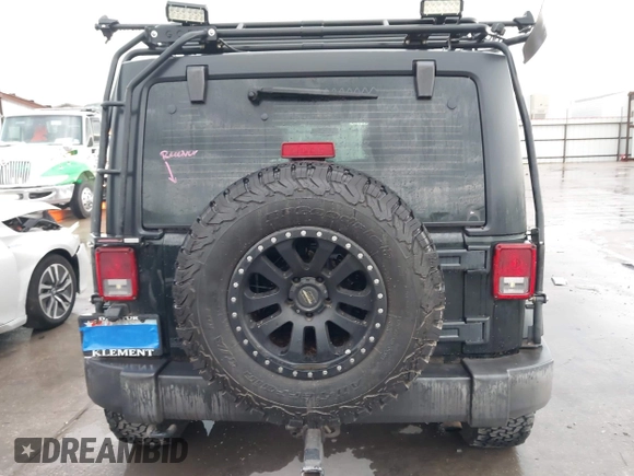 2012 Jeep Wrangler Unlimited Rubicon с VIN 1C4HJWFG3CL162098, выставлен на аукционе IAAI как лот 42469915 с пробегом 232 832 миль миль и . История ставок и продаж доступна на DreamBid. Изображение 15.