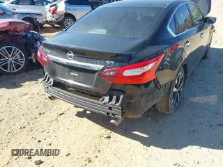 2018 Nissan Altima SR with VIN 1N4AL3AP9JC228304, listed as a IAAI auction lot 41883035 with 53,168 mi miles and . Bid and sale history available at DreamBid. Image 6.