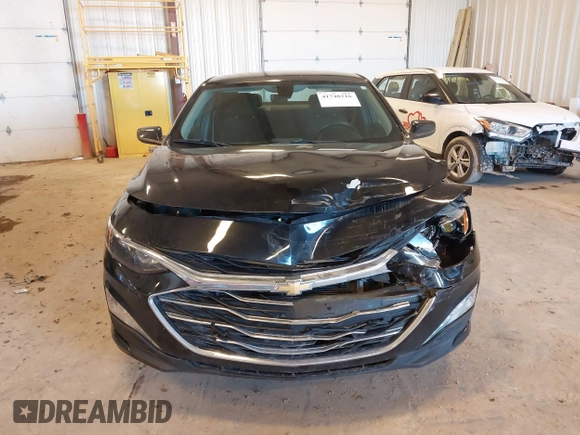 2020 Chevrolet Malibu LT with VIN 1G1ZD5ST4LF099559, listed as a IAAI auction lot 41748216 with 127,663 mi miles and . Bid and sale history available at DreamBid. Image 12.