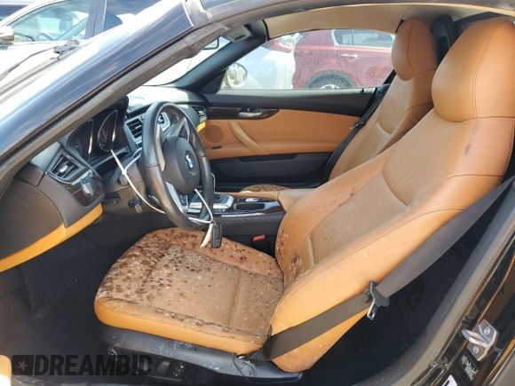 2013 BMW Z4 sDrive28i with VIN WBALL5C54DJ103864, listed as a Copart auction lot 74069774 with 36,161 mi miles and Salvage Title. Bid and sale history available at carsss.com. Image 7.