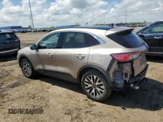 2020 Ford Escape Titanium with VIN 1FMCU9J90LUA49890, listed as a Copart auction lot 57228065 with 24,283 mi miles and Salvage title. Bid and sale history available at DreamBid. Image 2.