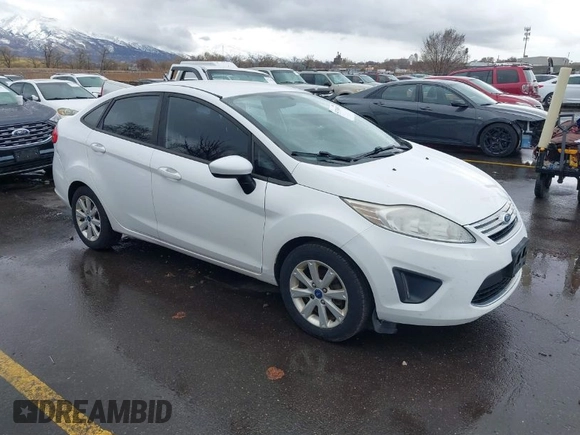 2012 Ford Fiesta SE with VIN 3FADP4BJ8CM102695, listed as a IAAI auction lot 41734833 with 131,779 mi miles. Bid and sale history available at carsss.com. Image 1.