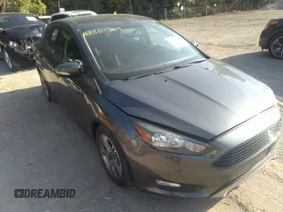 2017 Ford Focus SE with VIN 1FADP3FE3HL295192, listed as a IAAI auction lot 42664709 with 47,589 mi miles and . Bid and sale history available at DreamBid. Image 1.
