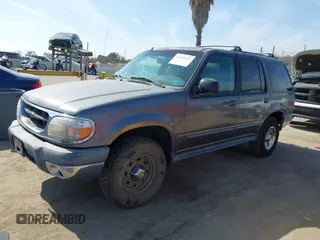 1999 Ford Explorer XLT z VIN 1FMZU32E8XUA34921, wystawiony jako IAAI lot #42162432 z przebiegiem 263 443 mil mil oraz . Historia ofert i sprzedaży dostępna na DreamBid. Obrazek 2.