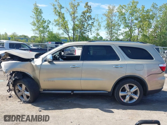 2011 Dodge Durango Citadel with VIN 1D4RE5GG3BC599473, listed as a IAAI auction lot 42216934 with 151,418 mi miles and . Bid and sale history available at DreamBid. Image 14.