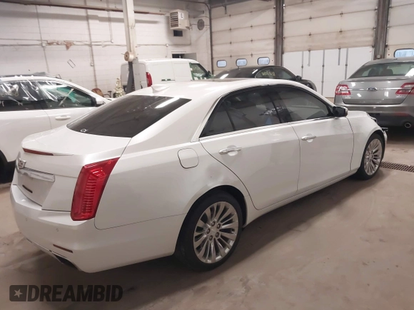 2016 Cadillac CTS Luxury Collection AWD with VIN 1G6AX5SS6G0125285, listed as a IAAI auction lot 42137355 with 110,299 mi miles and . Bid and sale history available at DreamBid. Image 4.