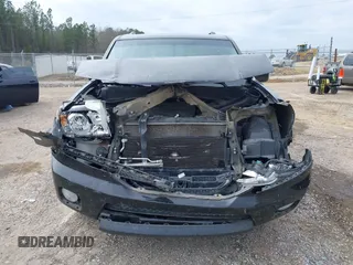 2011 Honda Pilot EX-L with VIN 5FNYF3H6XBB030039, listed as a IAAI auction lot 41596617 with 116,961 mi miles and . Bid and sale history available at DreamBid. Image 12.