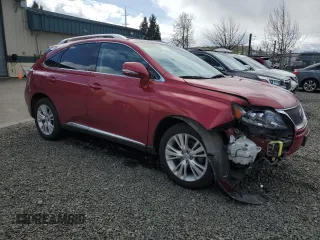 2010 Lexus RX 450h with VIN JTJBC1BAXA2403465, listed as a Copart auction lot 51248335 with 128,932 mi miles and Salvage Title. Bid and sale history available at DreamBid. Image 4.