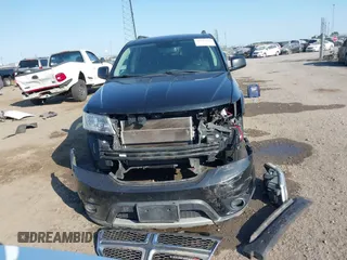 2013 Dodge Journey SXT with VIN 3C4PDCBG7DT710844, listed as a IAAI auction lot 40582910 with 136,741 mi miles and . Bid and sale history available at DreamBid. Image 12.
