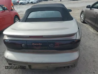 2002 Pontiac Firebird Trans Am z VIN 2G2FV32G022171702, wystawiony jako Copart lot #74819264 z przebiegiem Nie podano mil oraz Nie do naprawy • Non repairable. Historia ofert i sprzedaży dostępna na DreamBid. Obrazek 6.