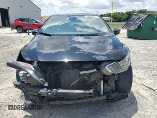 2021 Nissan Versa SV with VIN 3N1CN8EV7ML912282, listed as a Copart auction lot 58038755 with 65,525 mi miles and Salvage title. Bid and sale history available at DreamBid. Image 5.
