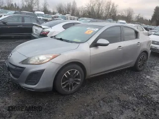 2011 Mazda 3 i Touring z VIN JM1BL1VG2B1355597, wystawiony jako Copart lot #53838445 z przebiegiem 165 833 mil mil oraz Szkoda całkowita • Salvage title. Historia ofert i sprzedaży dostępna na DreamBid. Obrazek 1.
