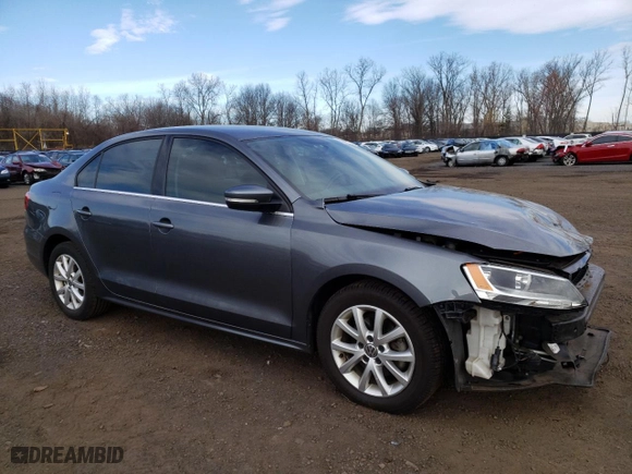2014 Volkswagen Jetta Sedan SE w/Connectivity with VIN 3VWD17AJ1EM328186, listed as a Copart auction lot 50975075 with 96,129 mi miles and Salvage Title. Bid and sale history available at carsss.com. Image 4.