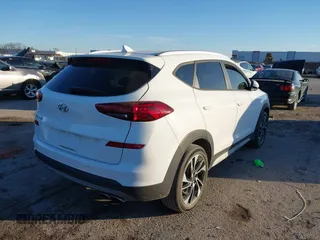 2019 Hyundai Tucson Sport with VIN KM8J33AL1KU838499, listed as a IAAI auction lot 41317832 with 71,594 mi miles. Bid and sale history available at carsss.com. Image 4.