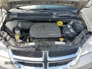 2014 Dodge Grand Caravan SXT z VIN 2C4RDGCG8ER266814, wystawiony jako Copart lot #52053155 z przebiegiem 279 551 mil mil oraz Tytuł czysty. Historia ofert i sprzedaży dostępna na DreamBid. Obrazek 12.