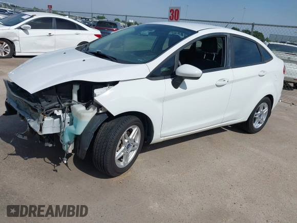 2017 Ford Fiesta SE z VIN 3FADP4BJ1HM126375, wystawiony jako IAAI lot #42244318 z przebiegiem 70 829 mil mil oraz . Historia ofert i sprzedaży dostępna na DreamBid. Obrazek 18.