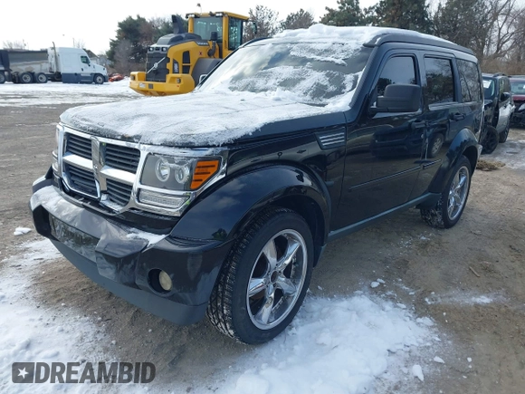 2007 Dodge Nitro SLT with VIN 1D8GU58K97W583862, listed as a IAAI auction lot 41378801 with 227,713 mi miles. Bid and sale history available at carsss.com. Image 2.