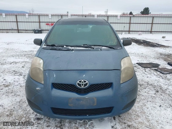 2010 Toyota Yaris with VIN JTDKT4K30A5321944, listed as a IAAI auction lot 41505259 with 140,929 mi miles. Bid and sale history available at carsss.com. Image 12.