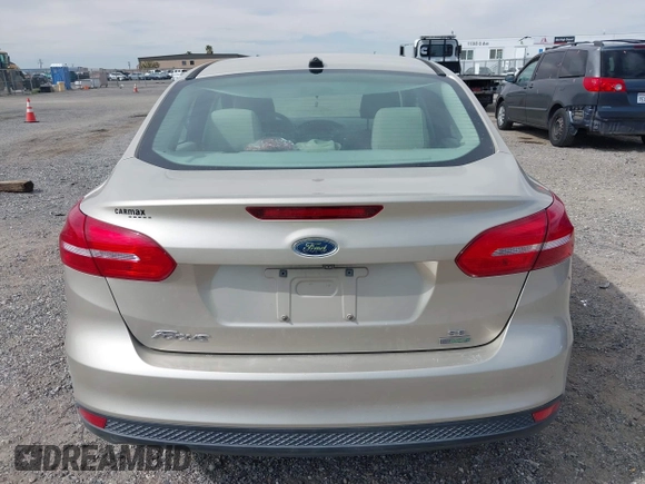 2018 Ford Focus SE with VIN 1FADP3FE7JL230870, listed as a IAAI auction lot 42021541 with 84,000 mi miles. Bid and sale history available at carsss.com. Image 16.