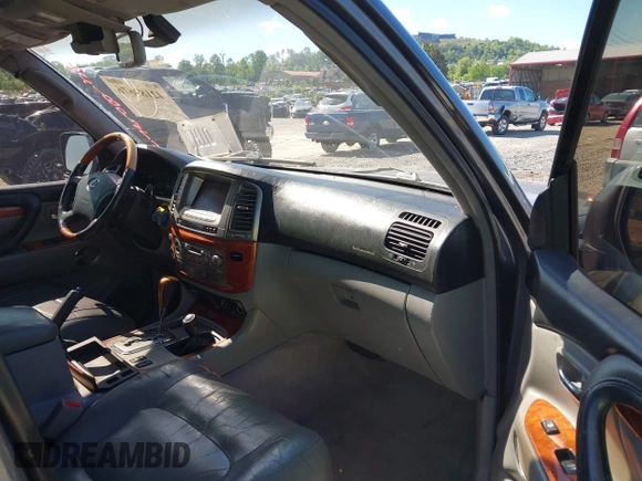 2003 Lexus LX with VIN JTJHT00W233532297, listed as a IAAI auction lot 42189676 with 235,992 mi miles. Bid and sale history available at carsss.com. Image 5.