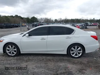 2014 Acura RLX with VIN JH4KC1F39EC004897, listed as a IAAI auction lot 41737436 with 101,104 mi miles. Bid and sale history available at carsss.com. Image 14.