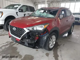 2021 Hyundai Tucson Value with VIN KM8J33A44MU363524, listed as a IAAI auction lot 41854508 with 59,821 mi miles. Bid and sale history available at carsss.com. Image 2.