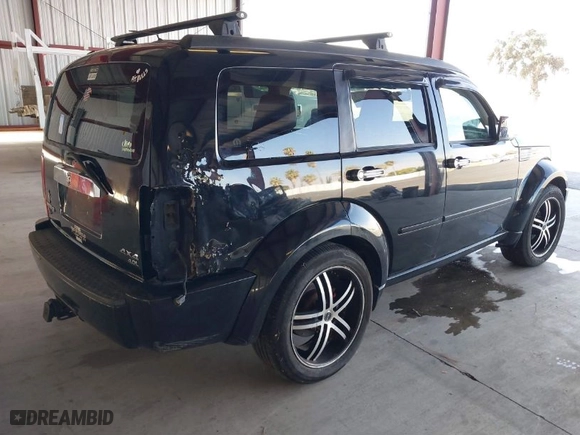 2007 Dodge Nitro R/T with VIN 1D8GU58637W630452, listed as a IAAI auction lot 40384758 with 160,498 mi miles. Bid and sale history available at carsss.com. Image 4.