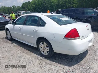 2013 Chevrolet Impala LT with VIN 2G1WG5E35D1215821, listed as a IAAI auction lot 39876555 with 152,325 mi miles and . Bid and sale history available at DreamBid. Image 3.
