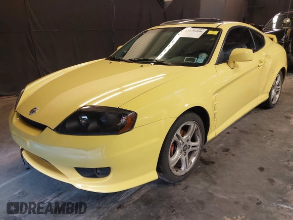 2006 Hyundai Tiburon GT z VIN KMHHN65F56U225936, wystawiony jako IAAI lot #41695280 z przebiegiem 121 110 mil mil oraz . Historia ofert i sprzedaży dostępna na DreamBid. Obrazek 18.