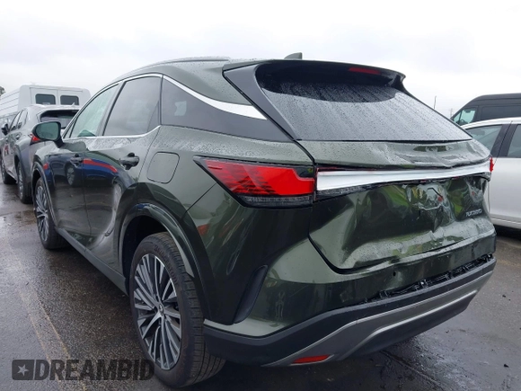 2023 Lexus RX with VIN JTJCHMAA0P2001696, listed as a IAAI auction lot 41518391 with 10,798 mi miles. Bid and sale history available at carsss.com. Image 3.