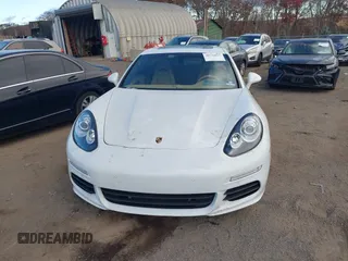2014 Porsche Panamera S E-Hybrid with VIN WP0AD2A76EL044722, listed as a IAAI auction lot 40716615 with 52,474 mi miles and . Bid and sale history available at DreamBid. Image 12.