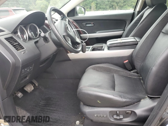 2014 Mazda CX-9 Grand Touring with VIN JM3TB2DA8E0440925, listed as a Copart auction lot 61002275 with 180,373 mi miles and Salvage title. Bid and sale history available at DreamBid. Image 7.