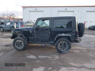 2009 Jeep Wrangler Rubicon with VIN 1J8GA641X9L706706, listed as a IAAI auction lot 41520129 with 176,345 mi miles. Bid and sale history available at carsss.com. Image 14.