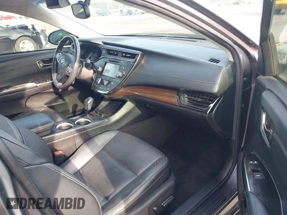 2015 Toyota Avalon Limited with VIN 4T1BK1EB4FU162164, listed as a IAAI auction lot 42041070 with 176,167 mi miles and . Bid and sale history available at DreamBid. Image 5.