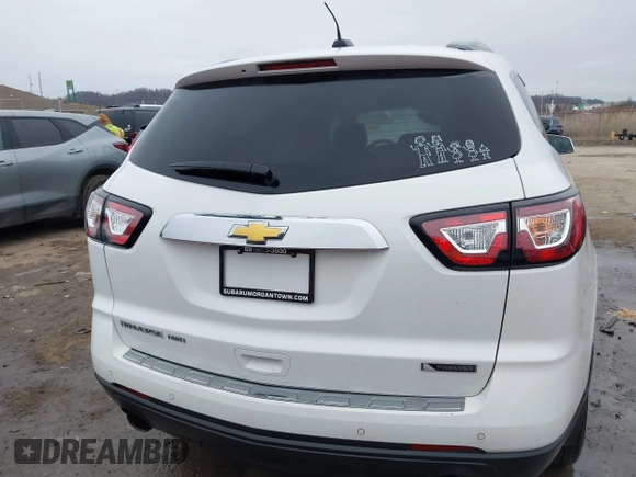 2017 Chevrolet Traverse Premier with VIN 1GNKVJKD5HJ324803, listed as a IAAI auction lot 41464714 with 98,753 mi miles and . Bid and sale history available at DreamBid. Image 16.