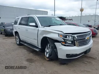 2016 Chevrolet Tahoe LTZ z VIN 1GNSCCKC7GR420201, wystawiony jako IAAI lot #42177392 z przebiegiem 66 705 mil mil oraz . Historia ofert i sprzedaży dostępna na DreamBid. Obrazek 1.