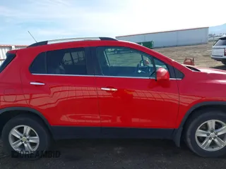 2016 Chevrolet Trax LTZ with VIN KL7CJRSBXGB572279, listed as a IAAI auction lot 41866351 with 97,363 mi miles. Bid and sale history available at carsss.com. Image 14.