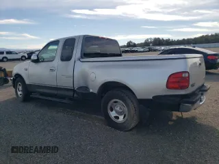 2001 Ford F-150 XL with VIN 1FTZX07261KF67717, listed as a Copart auction lot 78946214 with Not provided miles and Salvage title. Bid and sale history available at DreamBid. Image 2.